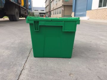 黄色いプラスチック収納用の箱は交通機関のために積み重なったふたを付けた